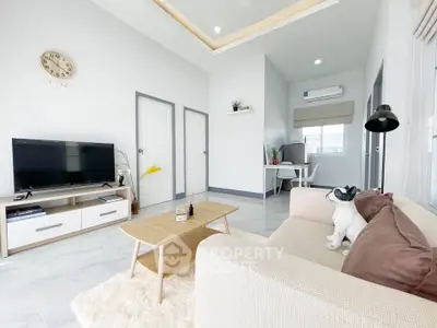 Modern living room with stylish decor and cozy seating area