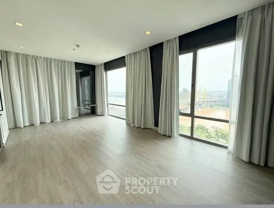 Spacious corner unit with large windows offering stunning city views