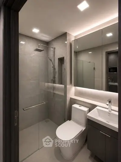 Modern bathroom with sleek shower and elegant fixtures in a contemporary apartment.
