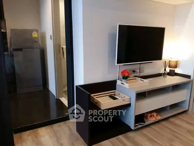 Modern living room with sleek TV setup and stylish decor