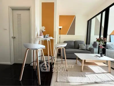 Modern living room with stylish decor and natural light