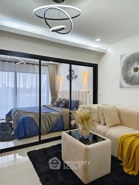 Modern living room with elegant decor and cozy seating area