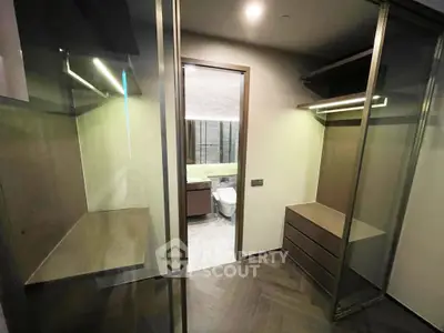 Luxurious walk-in closet with modern design and ample storage space