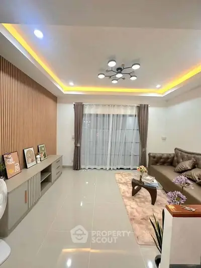 Modern living room with stylish lighting and elegant decor