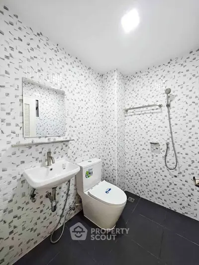 Modern bathroom with sleek fixtures and stylish tile design