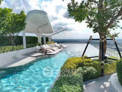 Luxurious rooftop pool with stunning city views and modern lounge chairs.