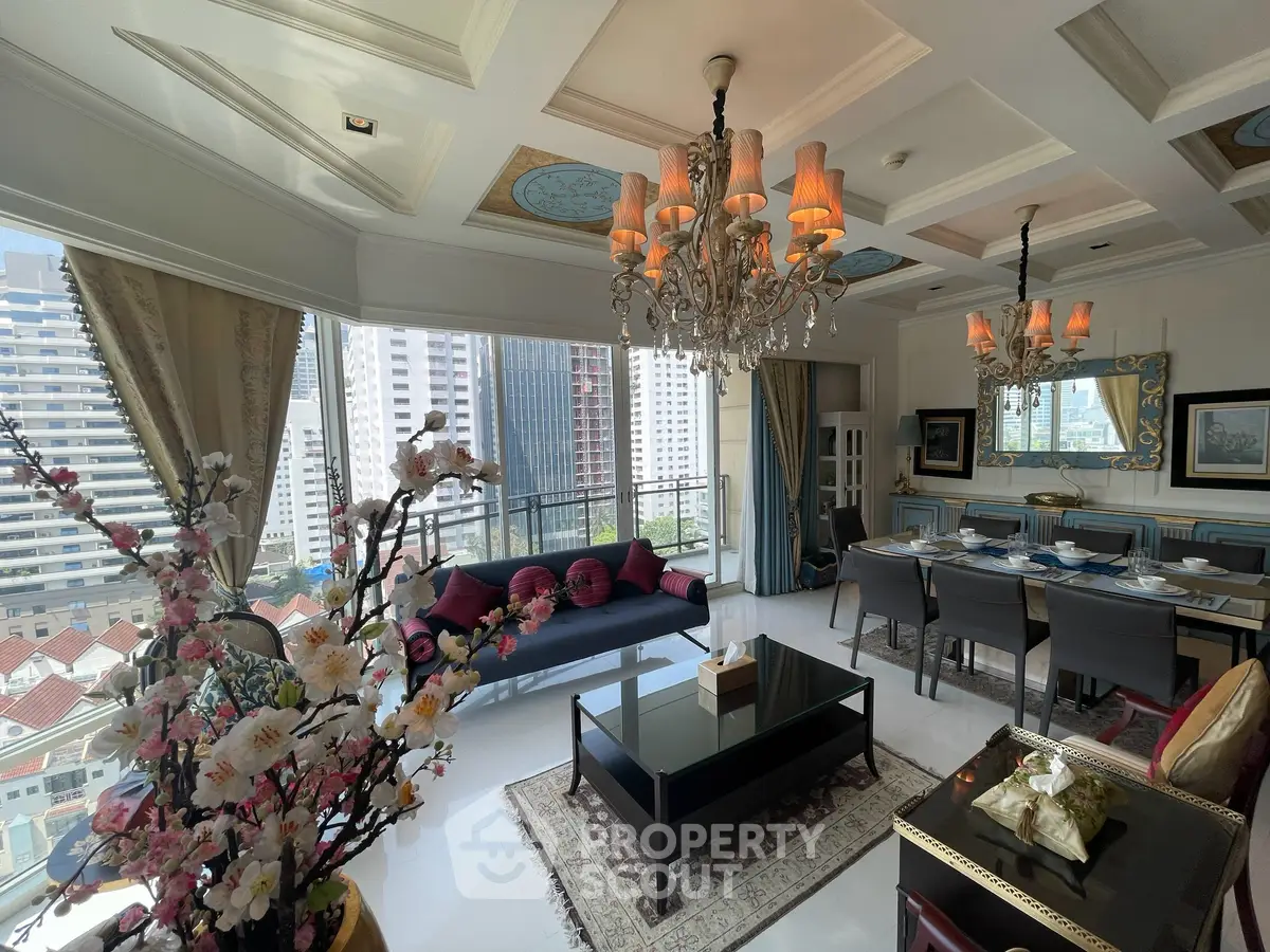 Luxurious living room with elegant chandeliers and stunning city view
