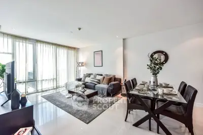 Spacious modern living room with dining area and large windows