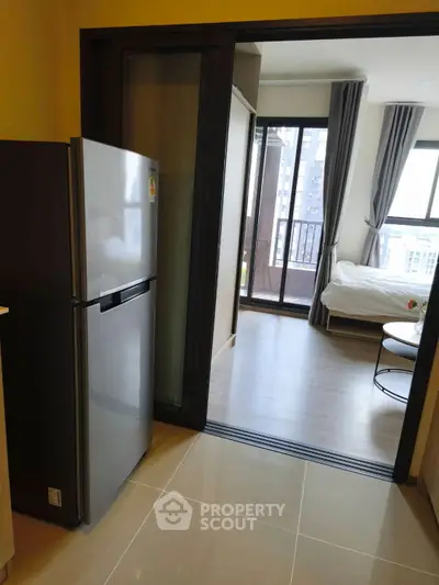 Modern bathroom with sleek design and large window for natural light.