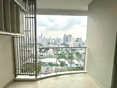 Stunning city view from modern balcony in high-rise apartment