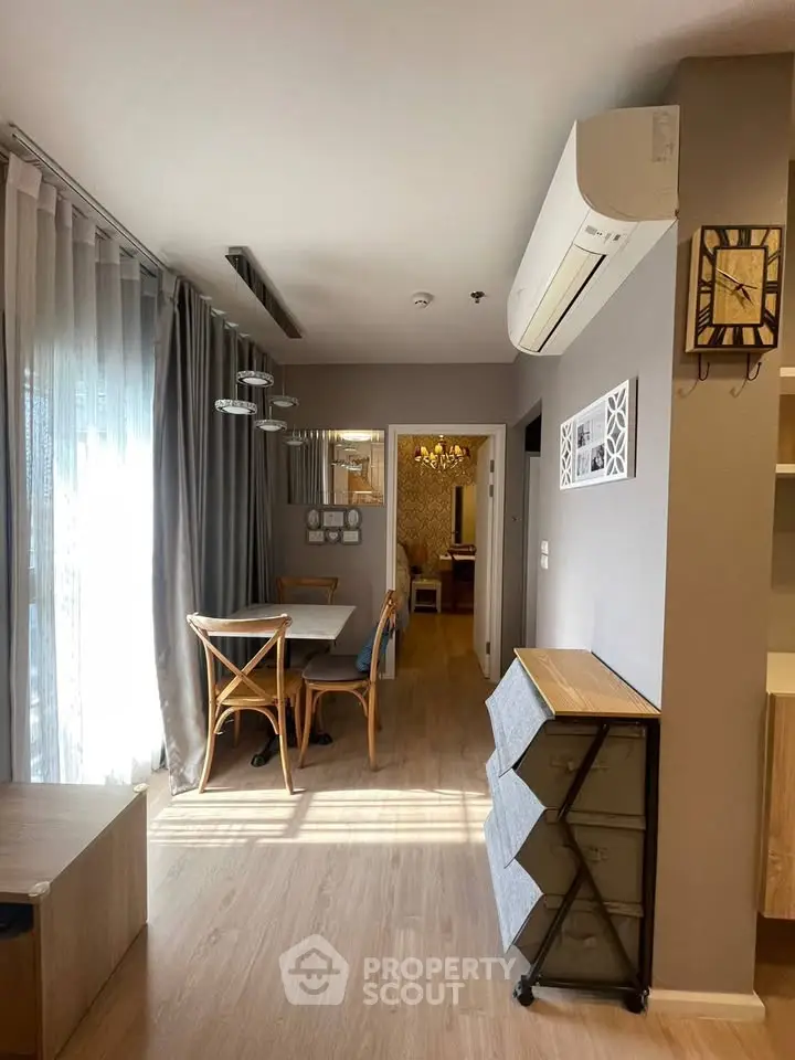 Chic dining area with modern decor and natural light in stylish apartment
