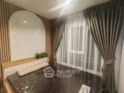 Luxurious bedroom with elegant curtains and modern decor