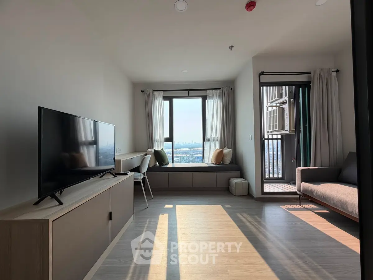 Modern living room with panoramic city view and stylish furniture