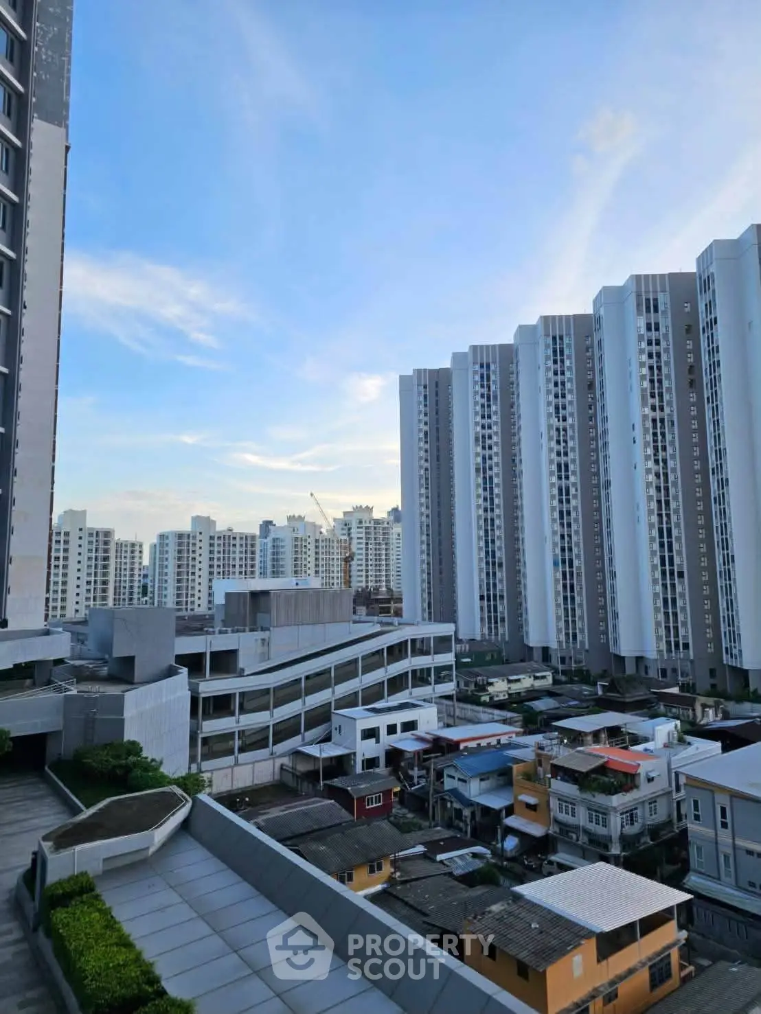 Stunning urban skyline view with modern high-rise buildings and clear blue sky.