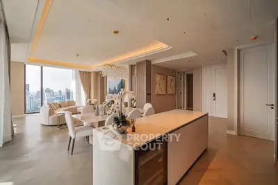 Luxurious open-plan living and dining area with stunning city views and elegant decor.