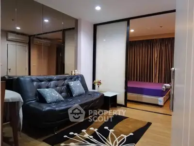 Modern apartment interior with stylish living room and cozy bedroom