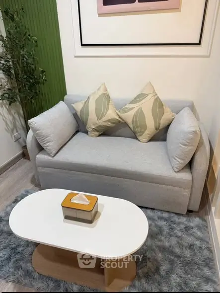 Cozy living room with stylish sofa and modern decor
