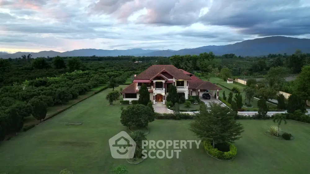 Luxurious estate with expansive garden and mountain views
