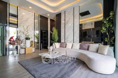 Luxurious modern living room with elegant decor and spacious seating area