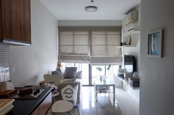 Modern living room with cozy seating and natural light