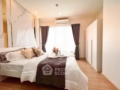 Luxurious bedroom with elegant decor and natural light