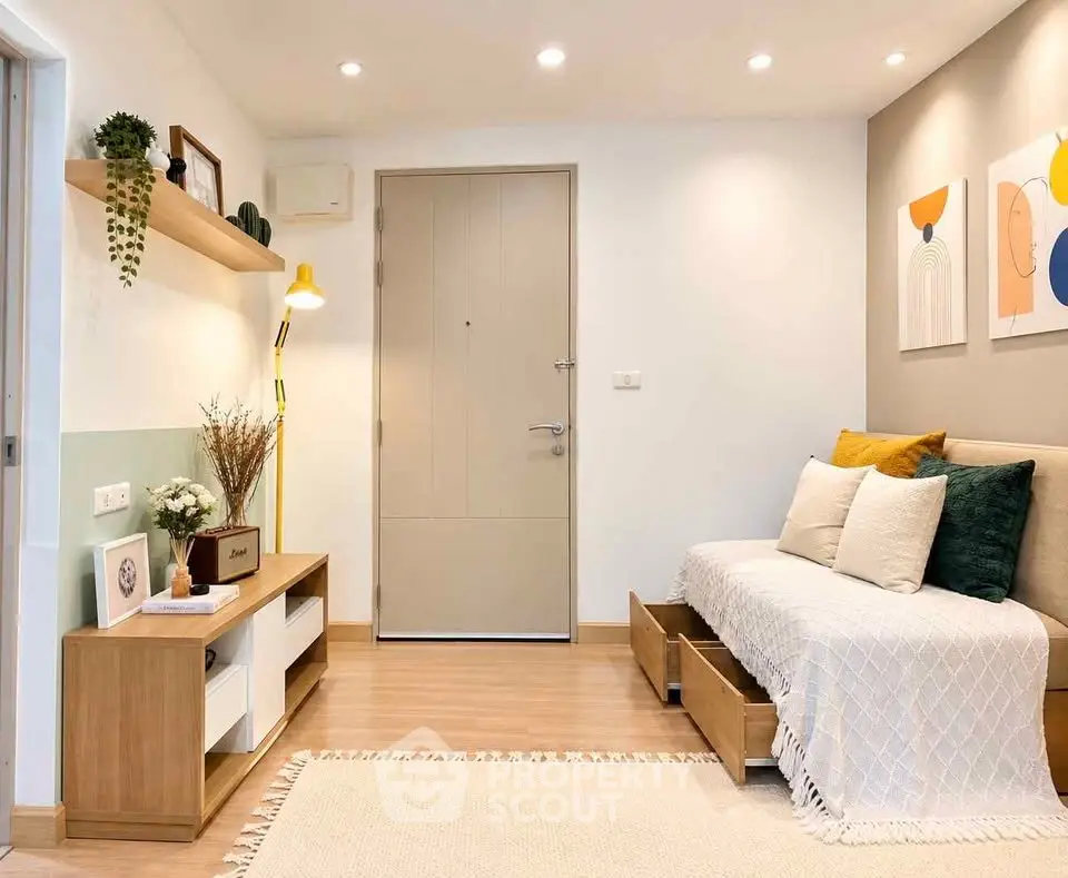 Chic living room with modern decor and cozy seating in a stylish apartment.