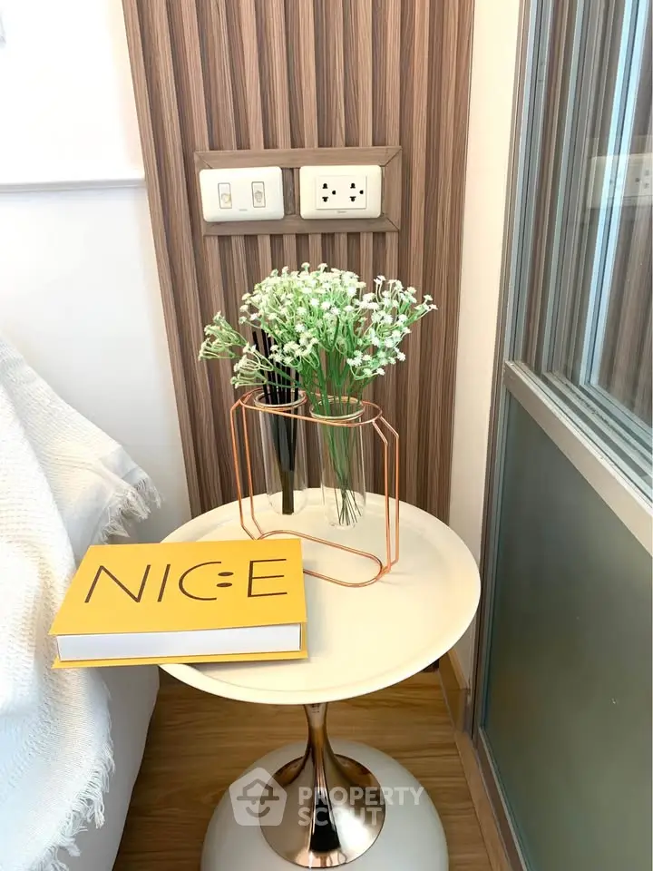 Stylish modern interior with elegant side table and decorative accents