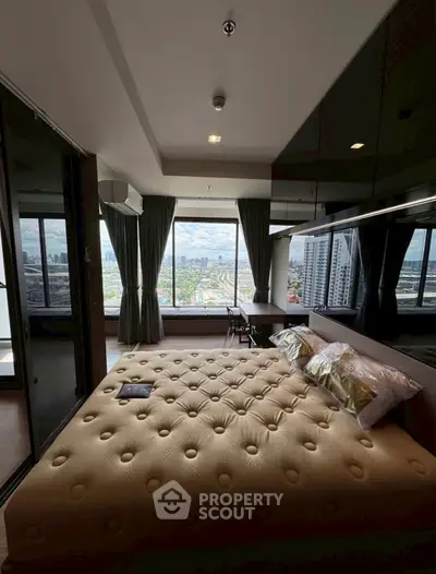 Luxurious bedroom with stunning city view and modern furnishings