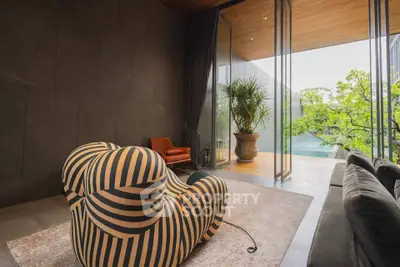 Luxurious living room with modern furniture and stunning garden view