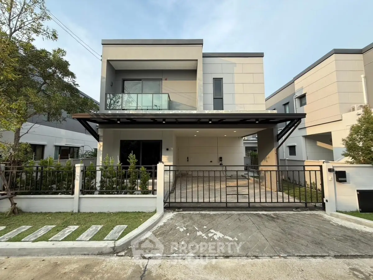 Modern two-story house with sleek design and spacious driveway