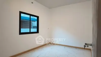 Minimalist empty room with window and tiled floor, perfect for customization.