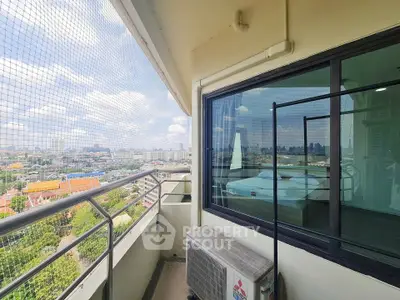 Stunning balcony view with cityscape and modern glass railing