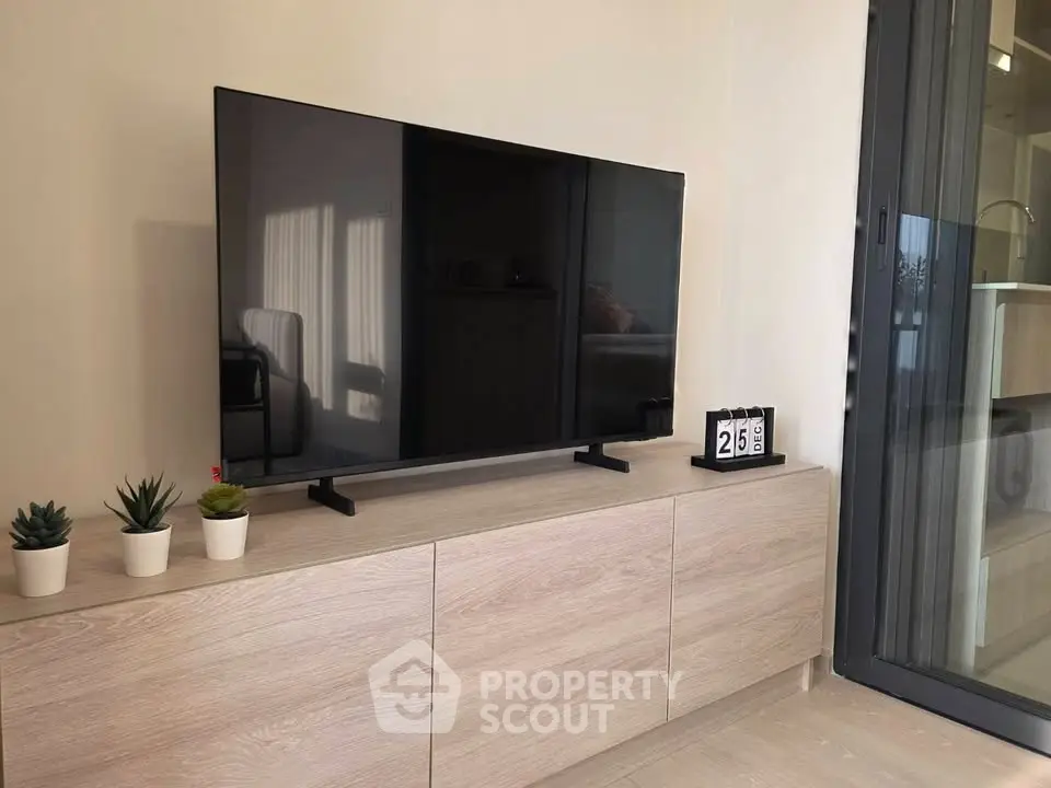 Modern living room with sleek TV setup and stylish decor