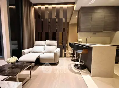 Modern living room with stylish open kitchen and cozy seating area