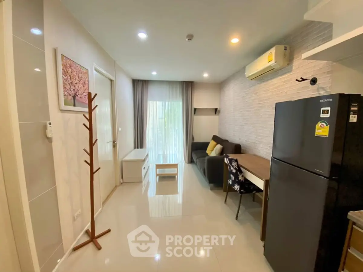 Modern living room with sleek furniture and air conditioning in a stylish apartment.