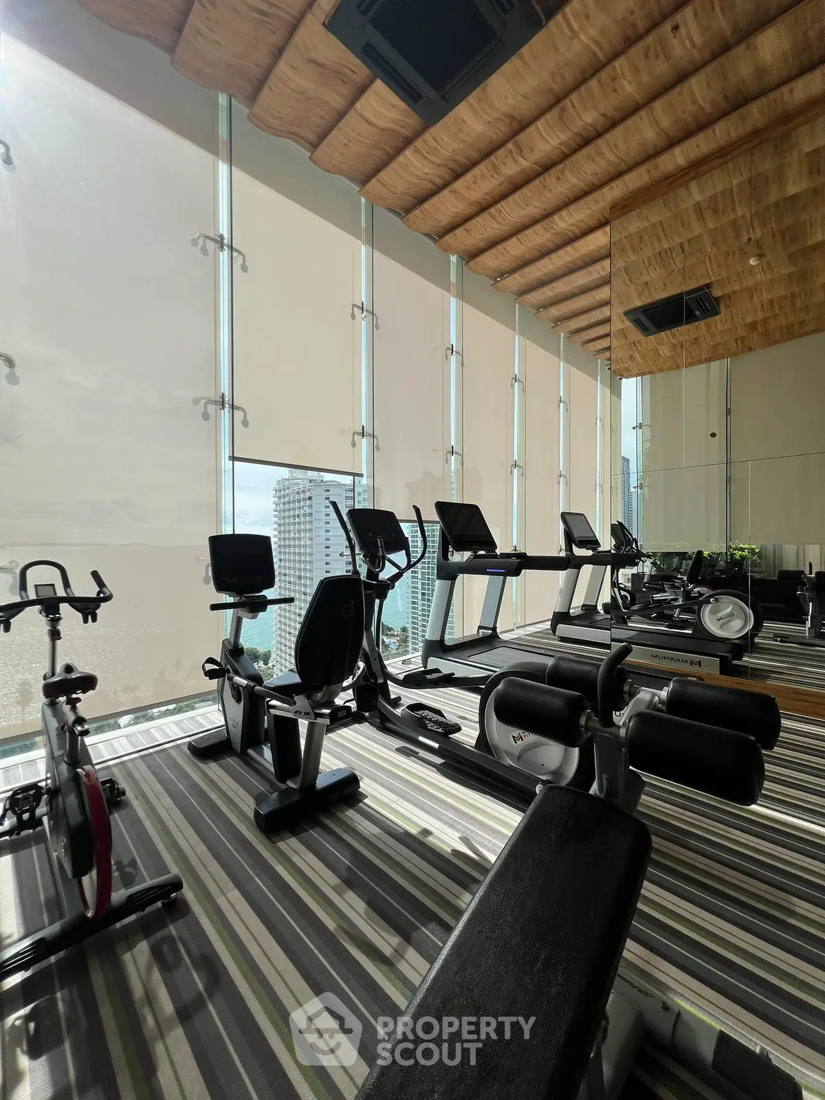 Modern gym with panoramic city views and state-of-the-art equipment