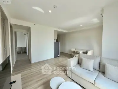 Spacious modern living room with elegant decor and natural light