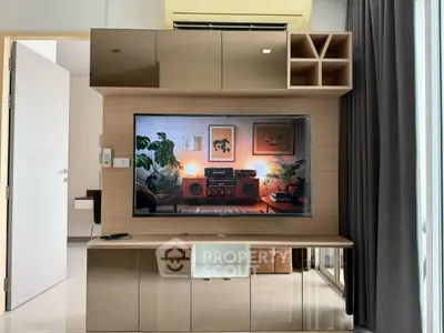 Modern living room with stylish entertainment center and sleek decor