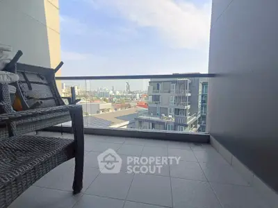 Spacious balcony with city view in modern apartment
