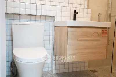 Modern bathroom with sleek fixtures and stylish tile design