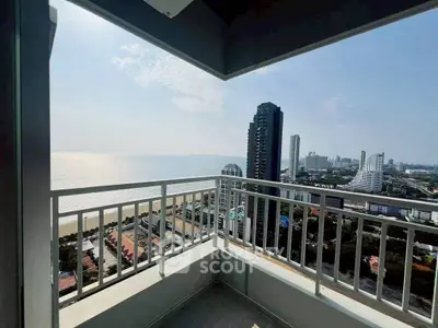 Stunning high-rise balcony with breathtaking ocean and city views.