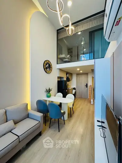 Modern duplex living room with stylish decor and open layout