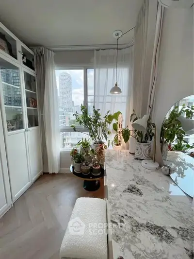 Chic urban living room with marble countertop and city view, perfect for modern lifestyle.