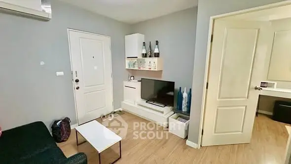 Cozy living room with modern decor and wooden flooring