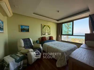 Cozy bedroom with stunning sea view and modern decor