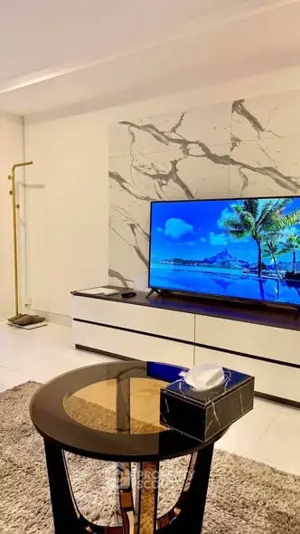 Modern living room with stylish TV setup and elegant decor