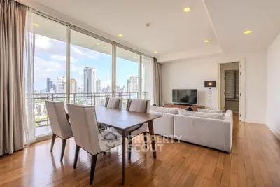 Luxurious living room with stunning city view and elegant dining area