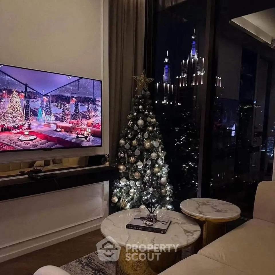 Luxurious living room with festive Christmas decor and stunning city view.