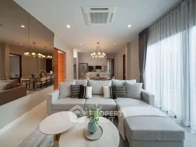 Luxurious modern living room with elegant decor and open layout