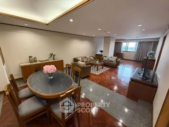 Spacious living room with elegant dining area and modern decor
